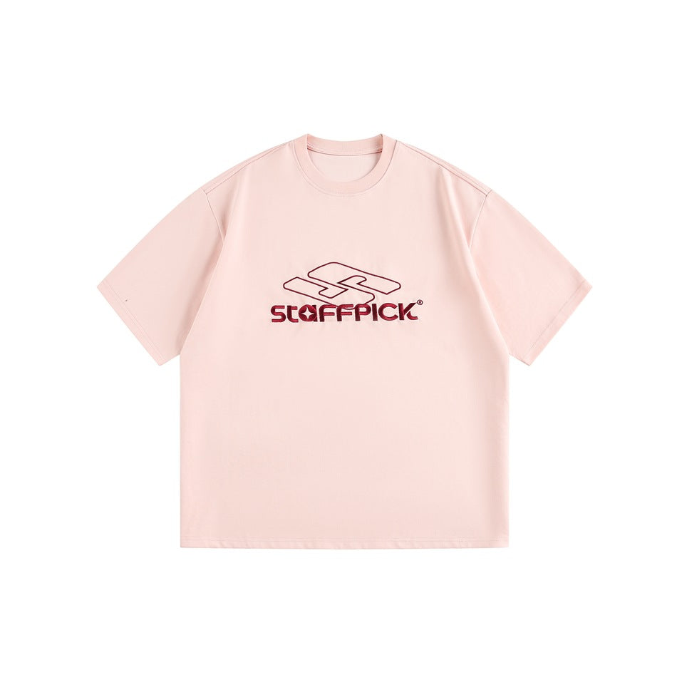 Front view of a pale pink short-sleeve T-shirt with a burgundy embroidered chest logo.