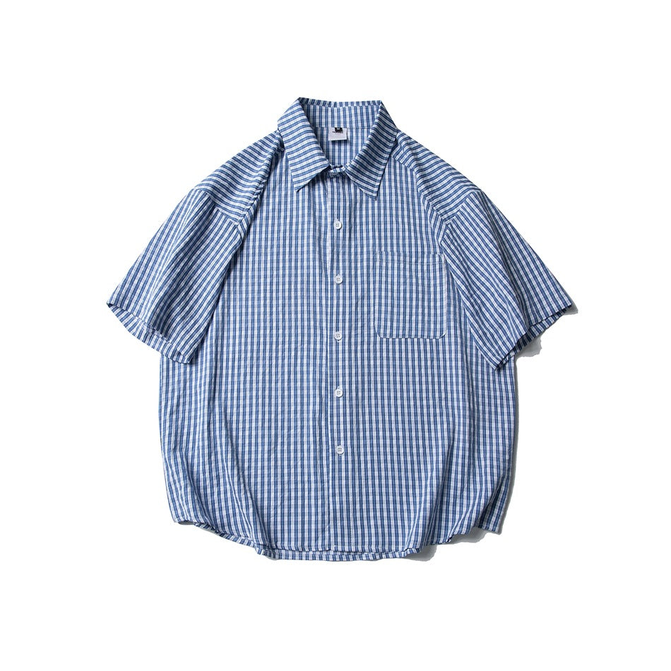 Blue and white plaid short-sleeve button-up shirt with chest pocket, flat lay front view
