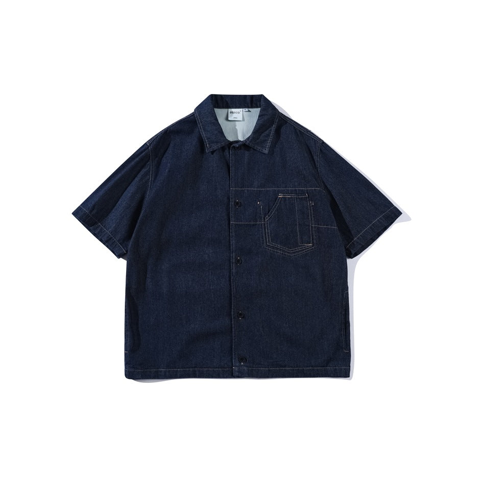 Dark indigo short-sleeve denim shirt, front flat lay with button placket, collar and chest patch pocket