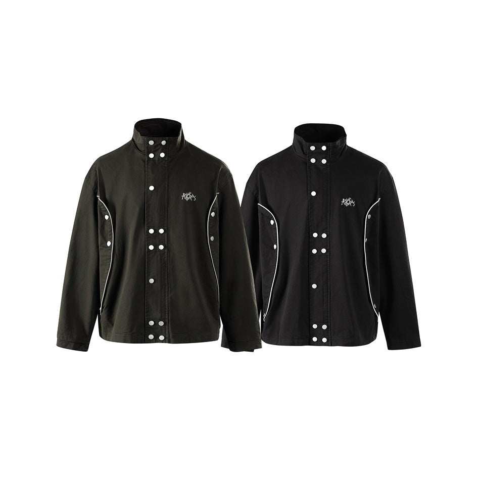 Two front views of a snap-front stand-collar jacket in dark olive and black, with white piping and small chest motifs.