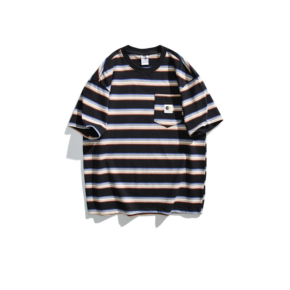 Black short-sleeve crew neck T-shirt with light blue, cream and rust stripes and a chest pocket with a small label