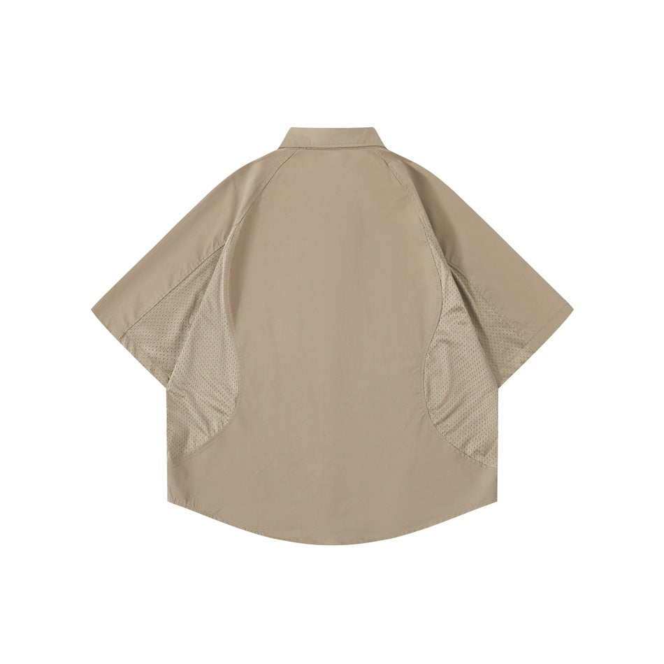 Back view of khaki short-sleeve shirt with perforated mesh panels at the sides and under the sleeves