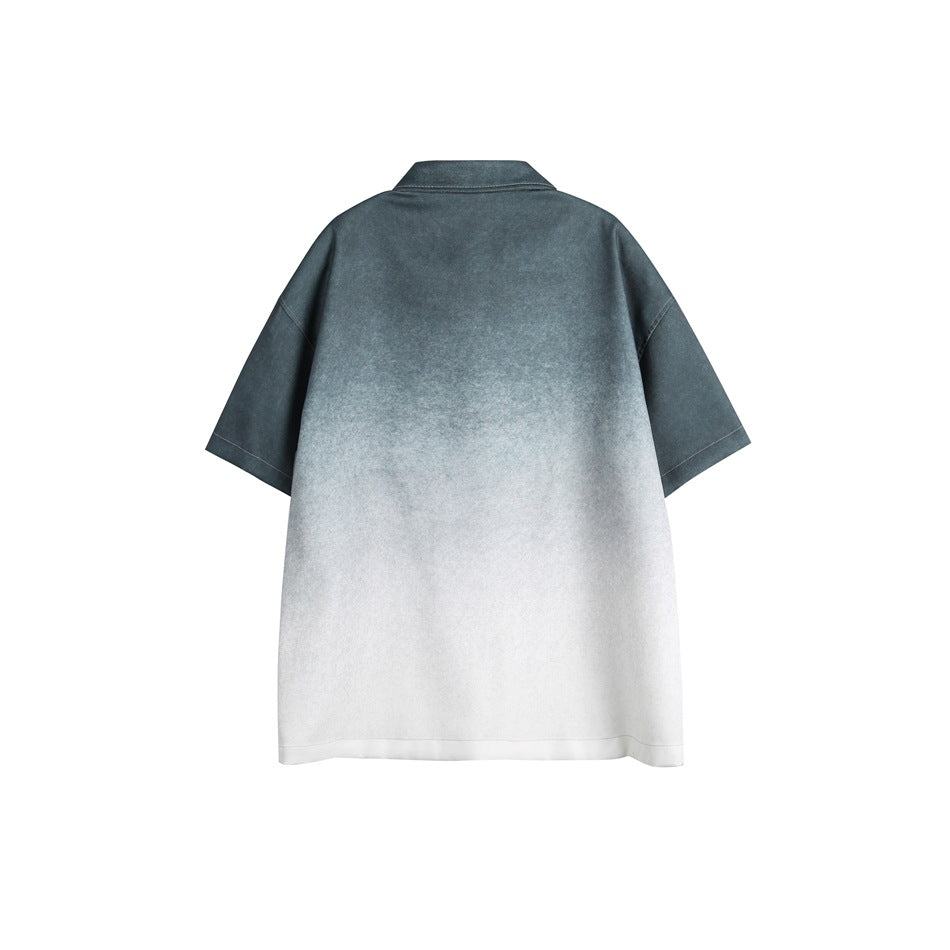 Back view of a short-sleeve collared shirt with a dark slate-to-white gradient.