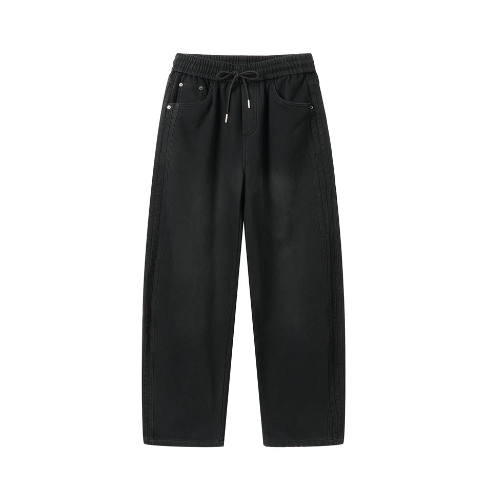 Black drawstring wide-leg pants with faded denim-like finish, front flat view