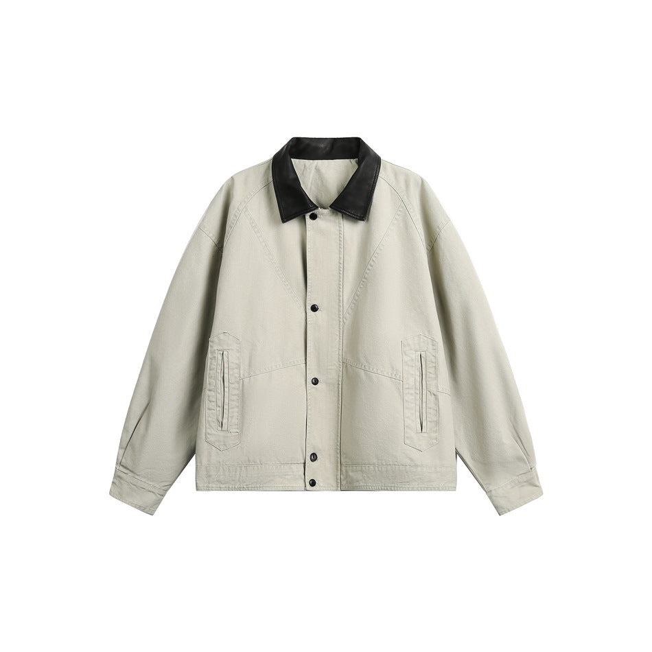 Off-white canvas-style jacket with black contrast collar, snap front and angled side pockets, flat lay front view