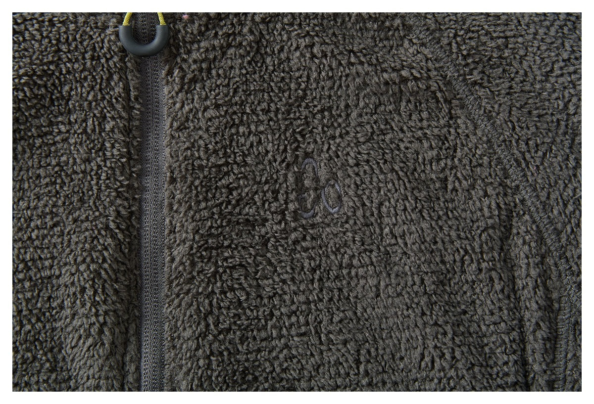 Close-up of the charcoal fleece jacket chest, showing the zipper and a small tone-on-tone embroidered mark.