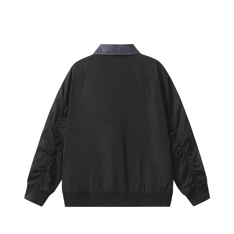 Back view of black bomber-style jacket with denim-look collar, ruched sleeves and ribbed hem and cuffs