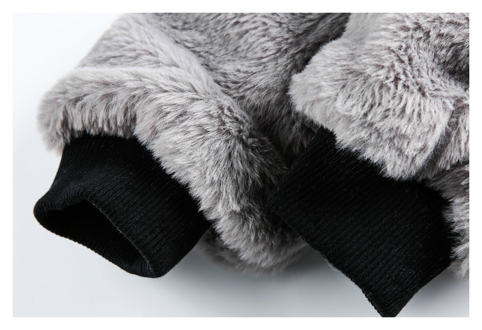 Close-up of shaggy gray sleeves with black ribbed cuffs.
