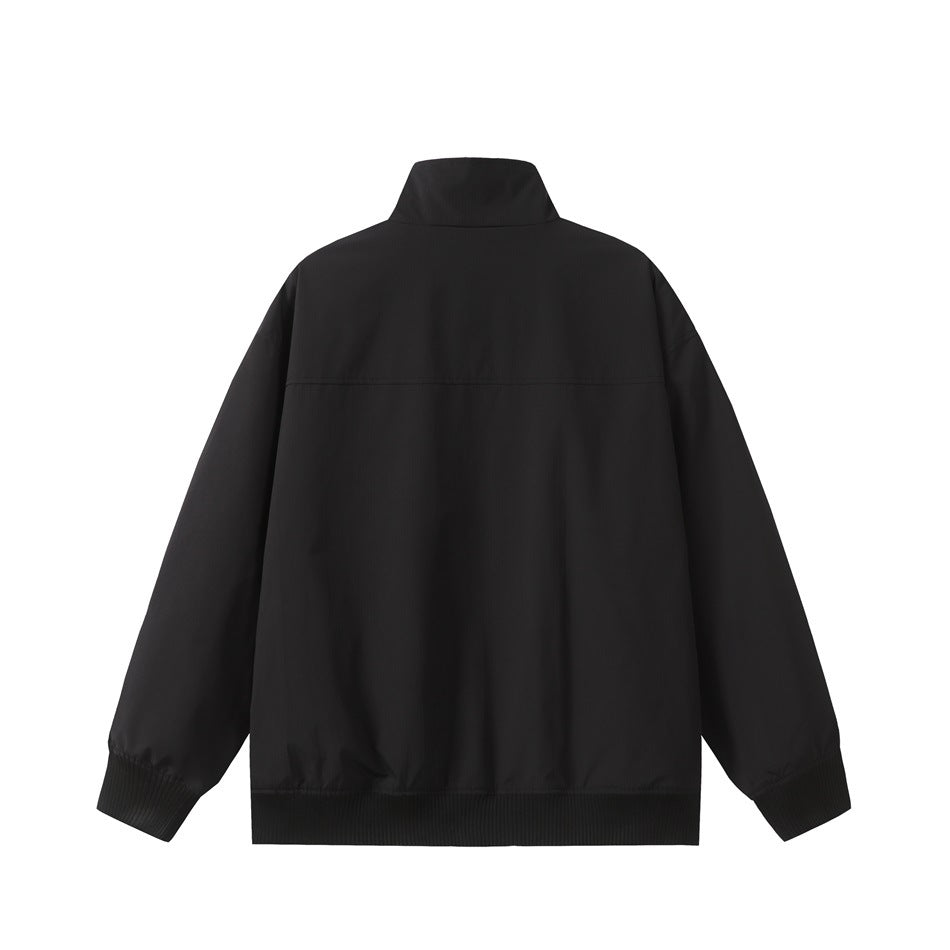 Black stand-collar jacket flat lay, back view, with back yoke seam and ribbed cuffs and hem