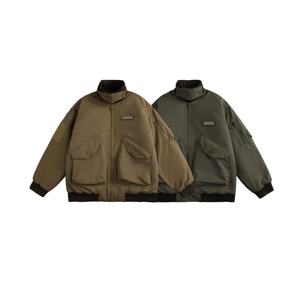 Two bomber jackets shown from the front in khaki and dark olive, with flap pockets and ribbed cuffs and hems.