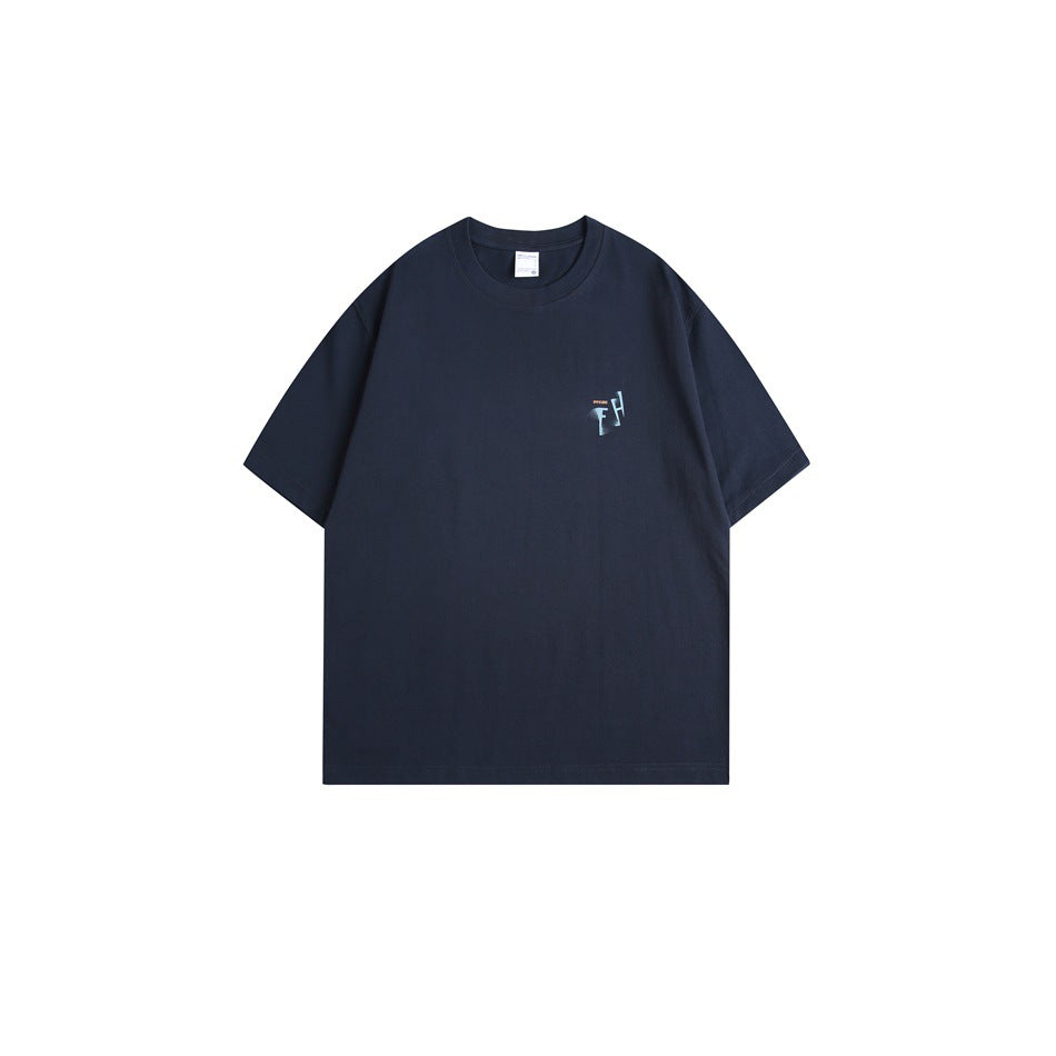 Navy short-sleeve crew-neck t-shirt front with small light blue graphic print on the left chest