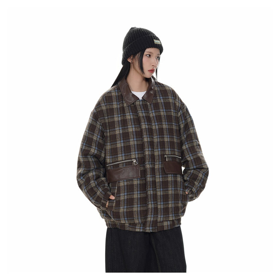 Model in a brown plaid jacket with a dark brown collar and zip pockets, shown from the front at a slight angle.