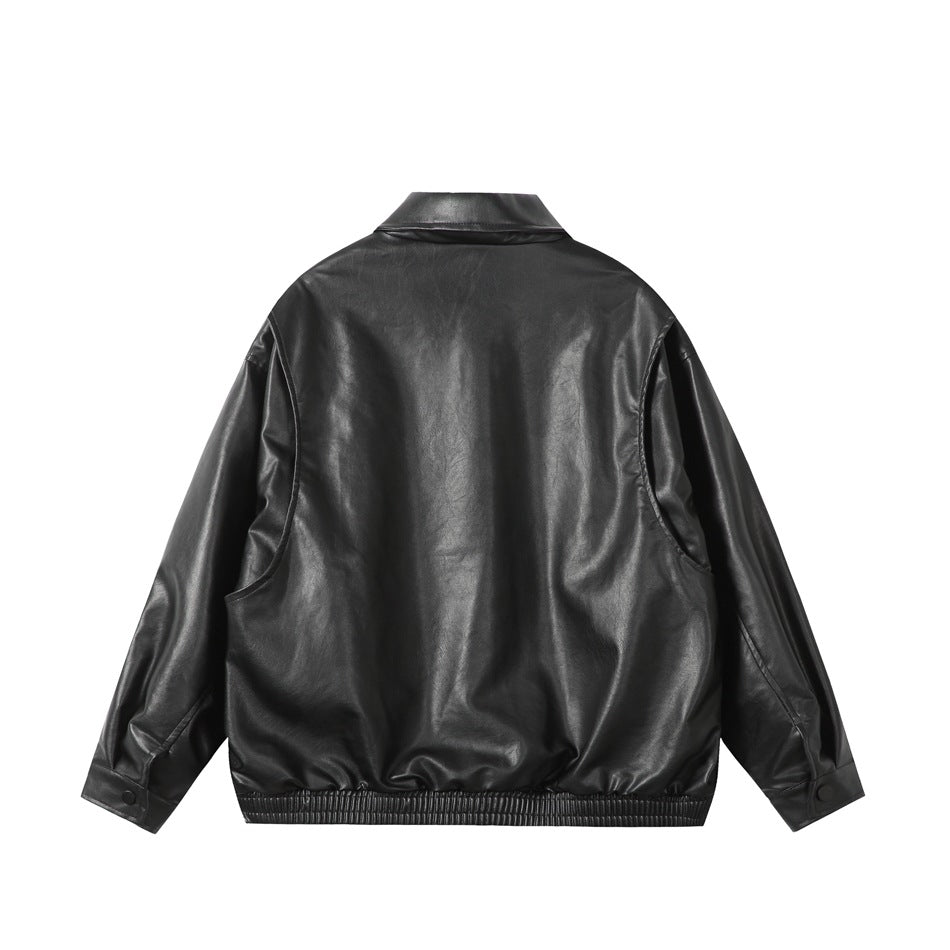 Back view of a black jacket with a pointed collar, long sleeves, and an elastic hem.
