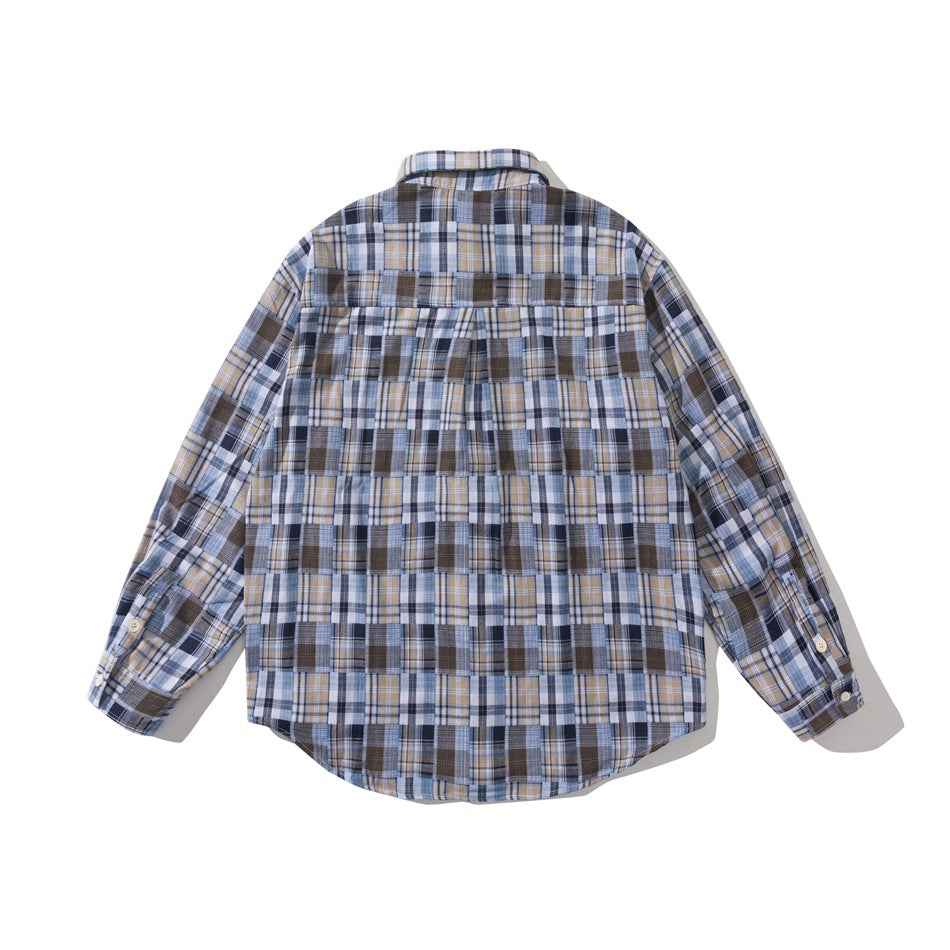 Back view of blue patchwork plaid long-sleeve shirt with back yoke, button cuffs and curved hem