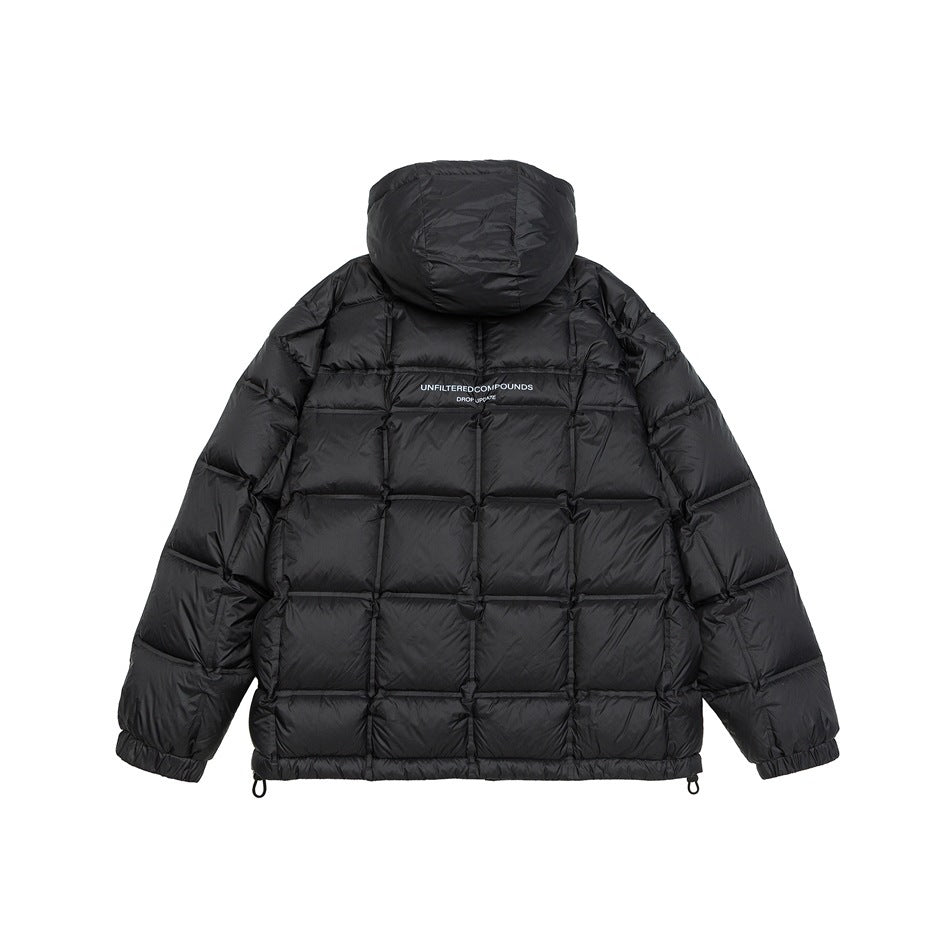 Back view of a black hooded puffer jacket with square quilted panels and small white lettering across the upper back.