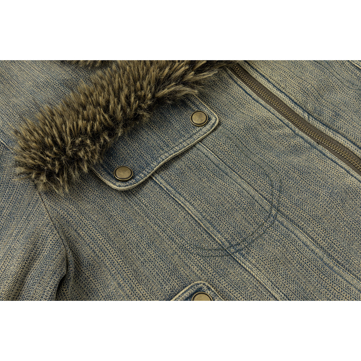 Close-up of the jacket's textured front, zipper, buttoned flap, and brown-black fur trim.