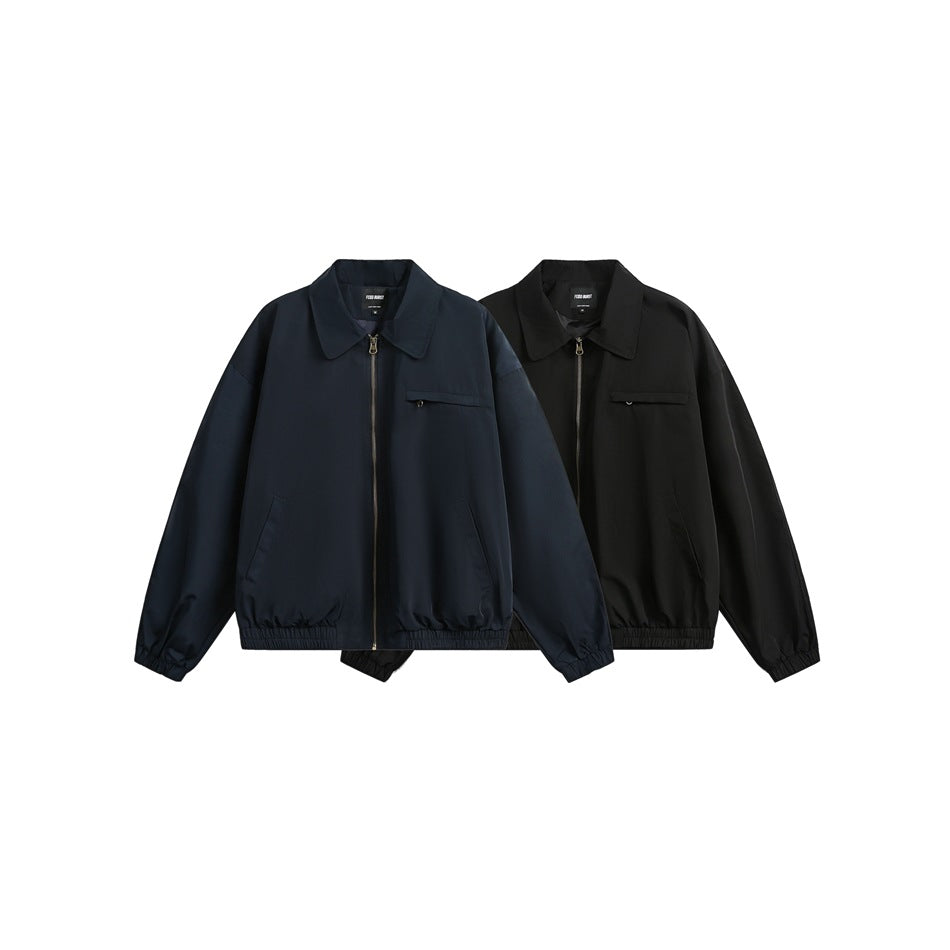 Two zip-front jackets displayed together: one dark navy and one black, both with collars and chest pockets.