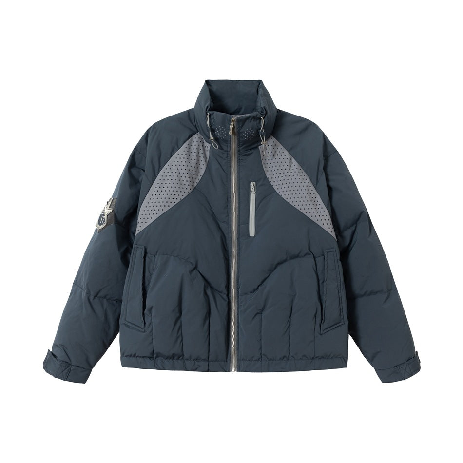 Blue quilted puffer jacket with stand collar, center zipper and gray perforated panels, flat front view