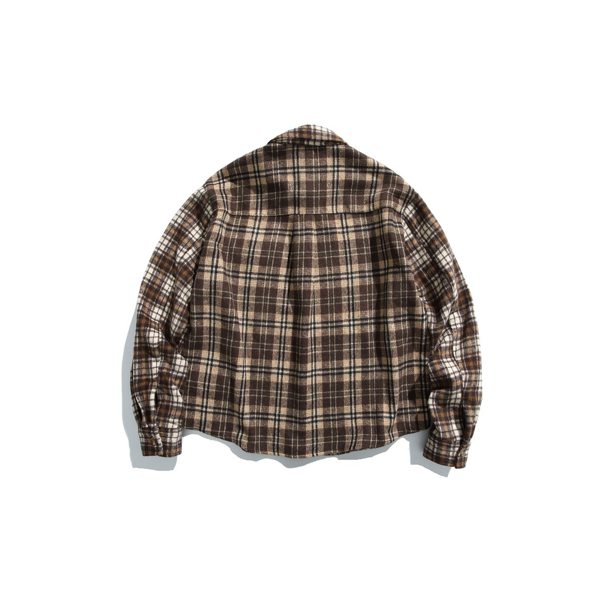 Back view of brown plaid long-sleeve shirt flat lay with back yoke and center pleat