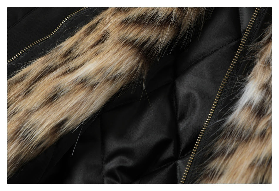 Close-up of the black quilted coat lining framed by tan-brown fur trim and brass-tone zippers.