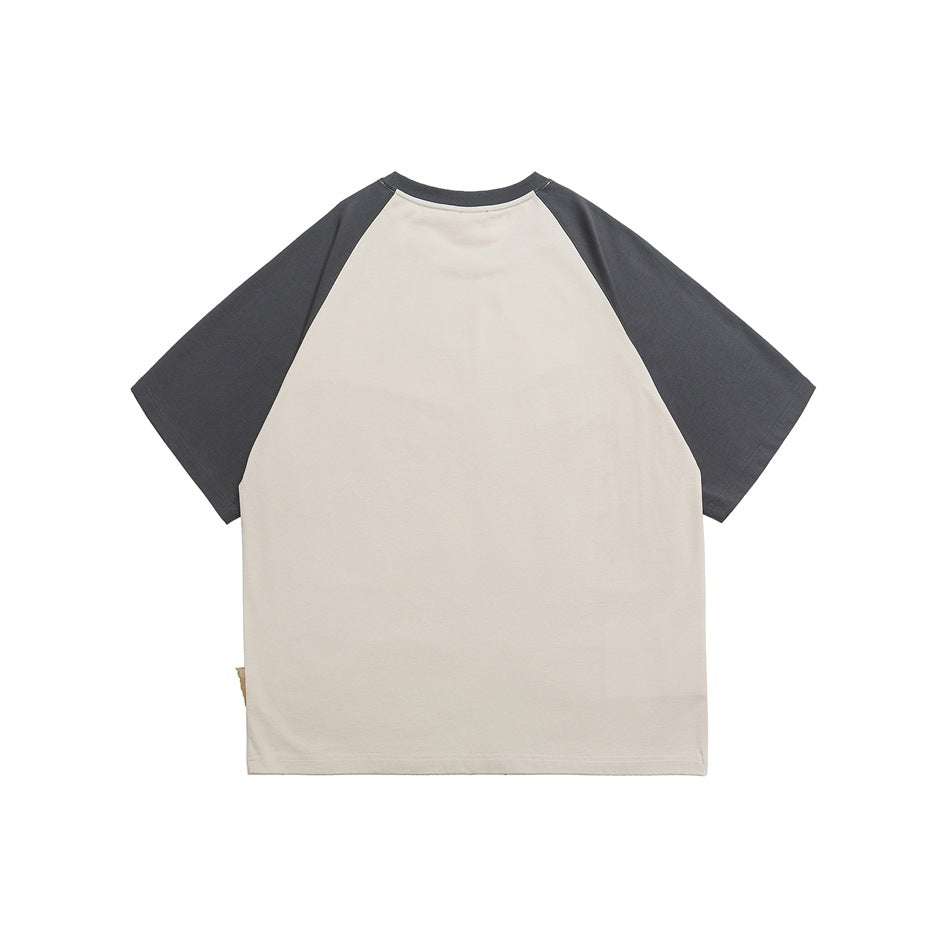 Back view of beige T-shirt with dark gray raglan sleeves and collar, plain back, flat lay
