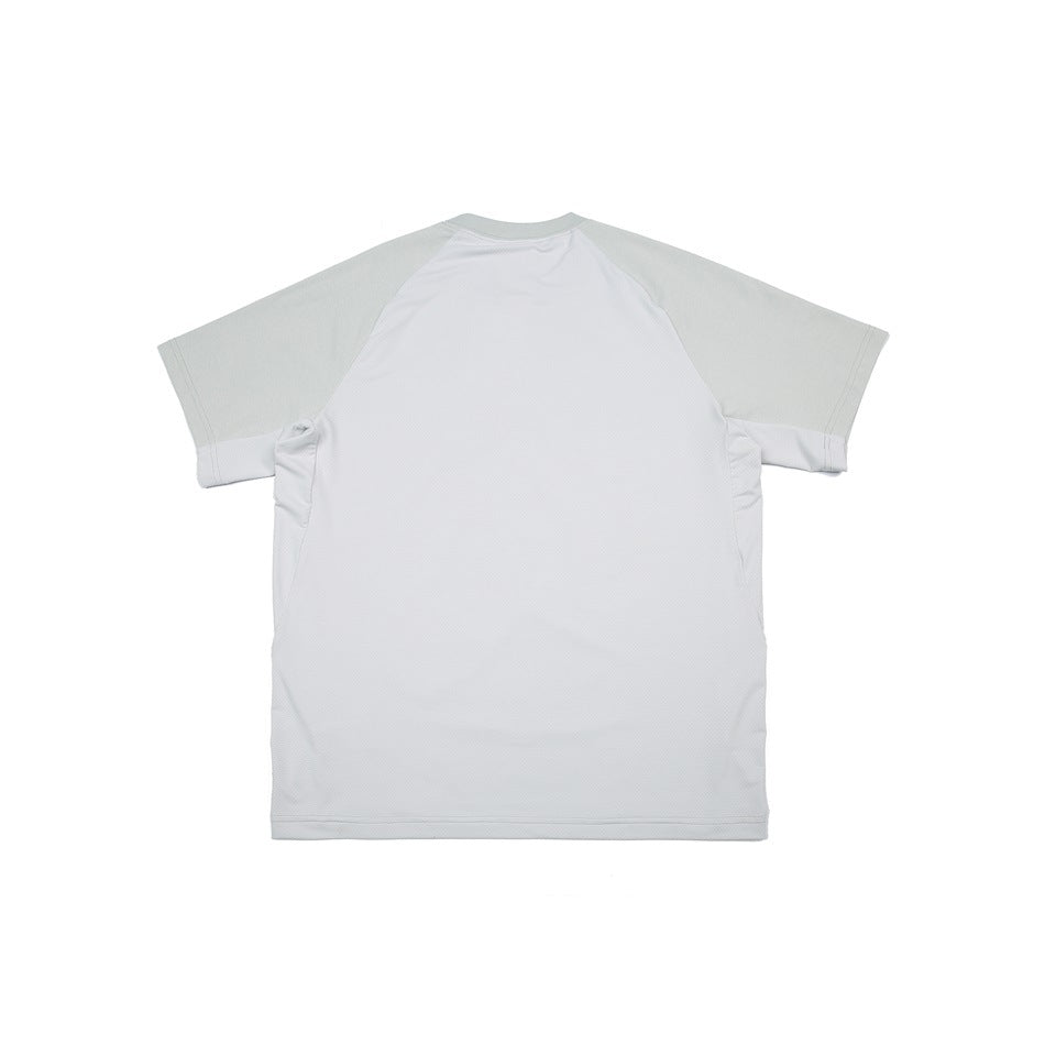 Back flat lay of a pale sage T-shirt with a large light textured back panel and matching side panels.