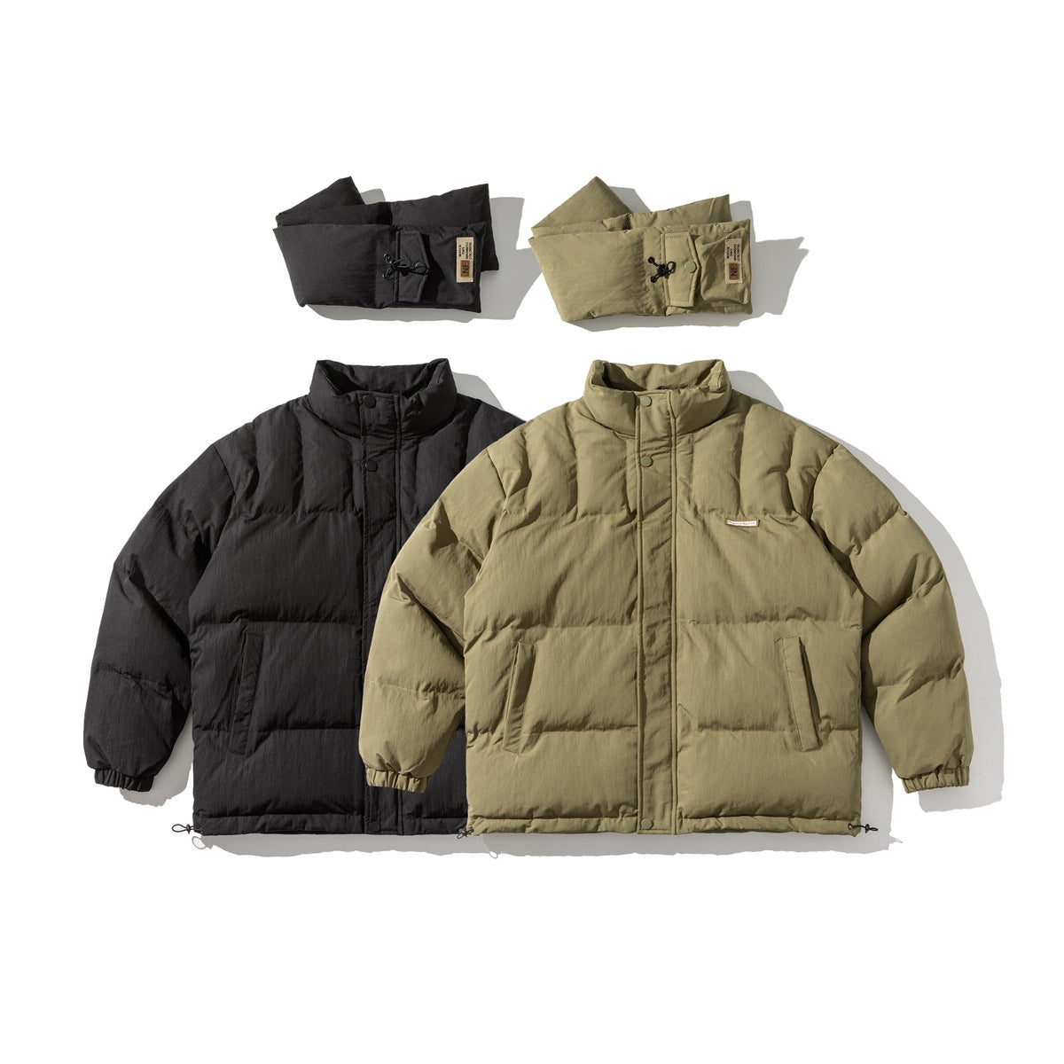 Black and khaki quilted puffer jackets side by side, each with a folded padded scarf above