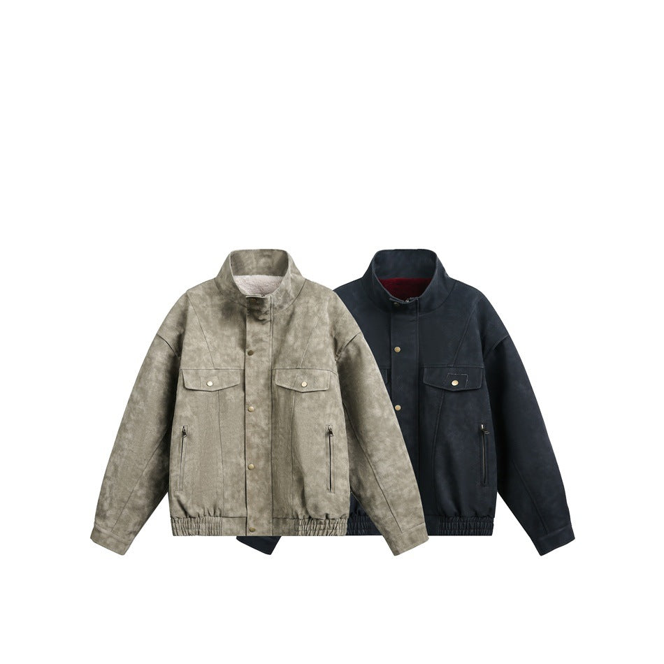 Two jackets displayed together: one mottled taupe and one dark charcoal, both with high collars and chest pockets.