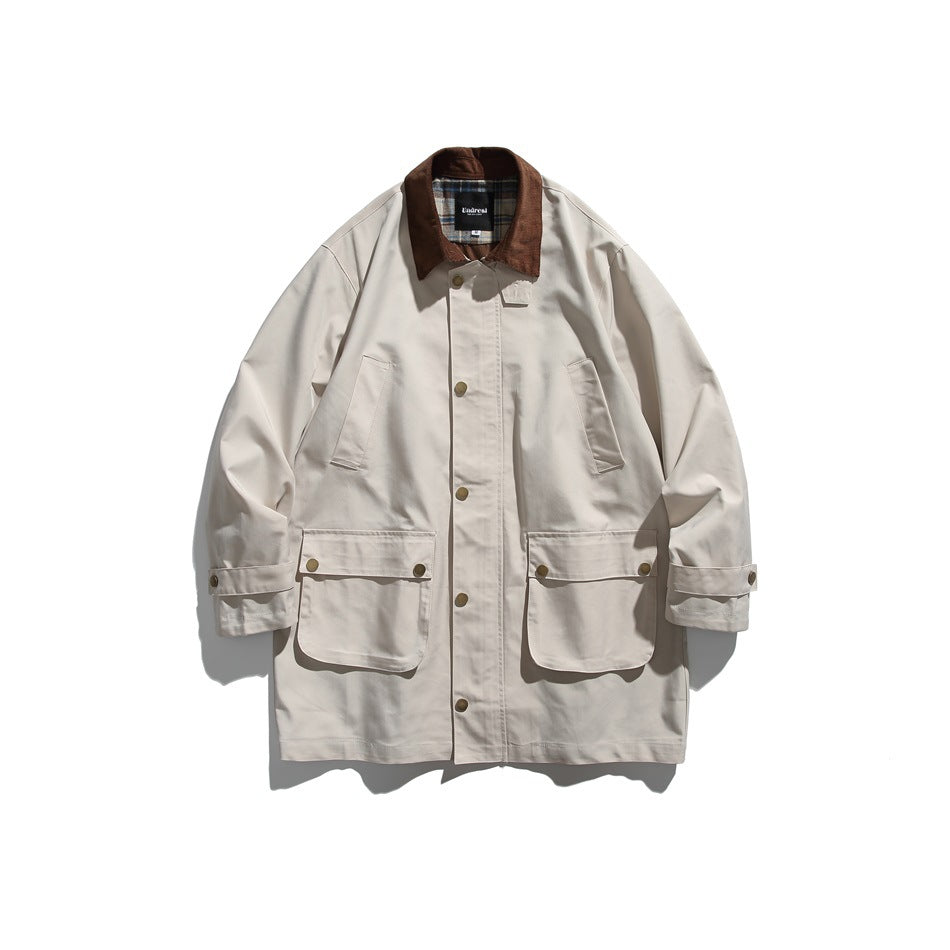 Off-white mid-length jacket flat lay with brown collar, plaid collar underside, button front and two large flap pockets