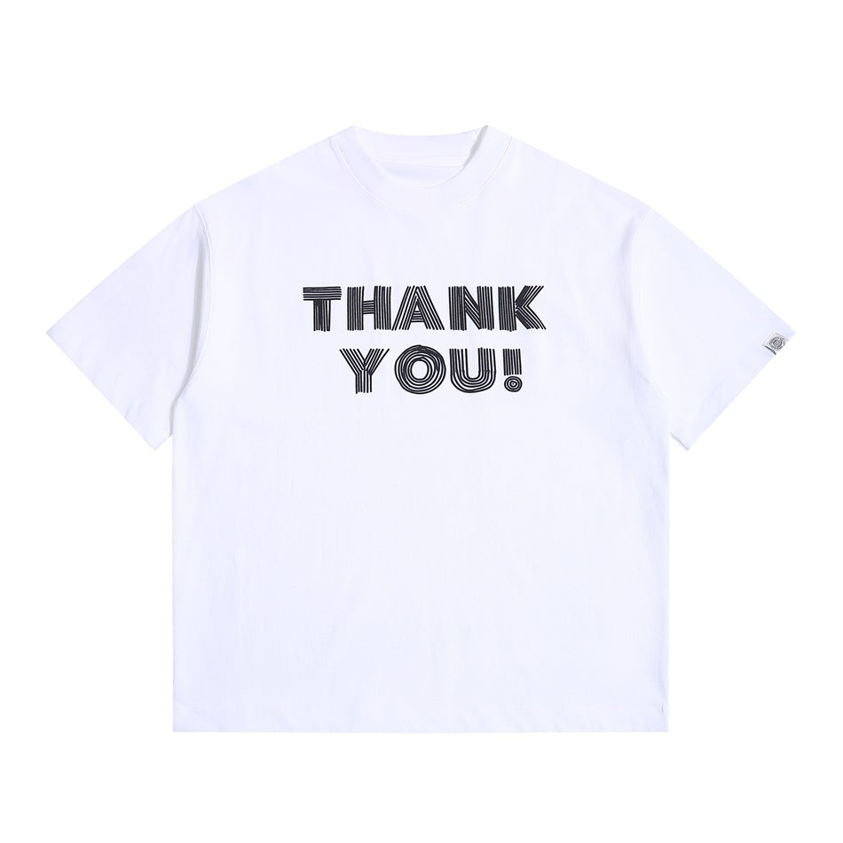 White short-sleeve crew-neck T-shirt with black outlined THANK YOU! graphic, flat lay front view