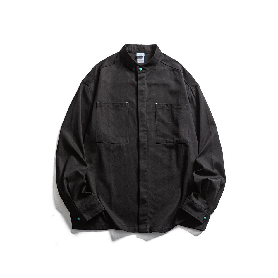 Black stand-collar long-sleeve shirt, front flat lay with two chest pockets and turquoise snap buttons