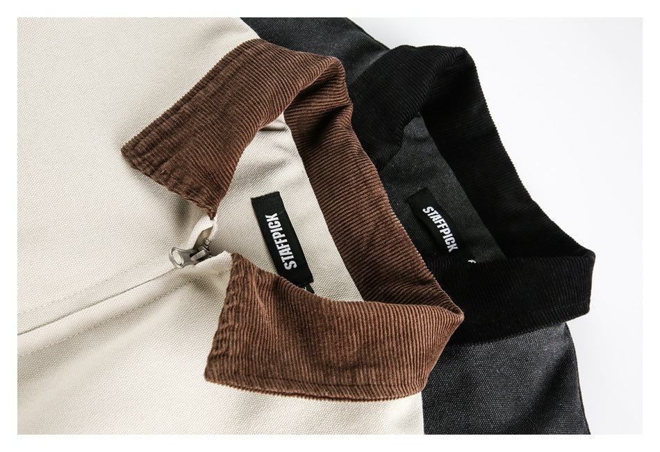 Close-up of overlapping ivory, brown, and black jackets, showing contrasting collars, zippers, and neck labels.
