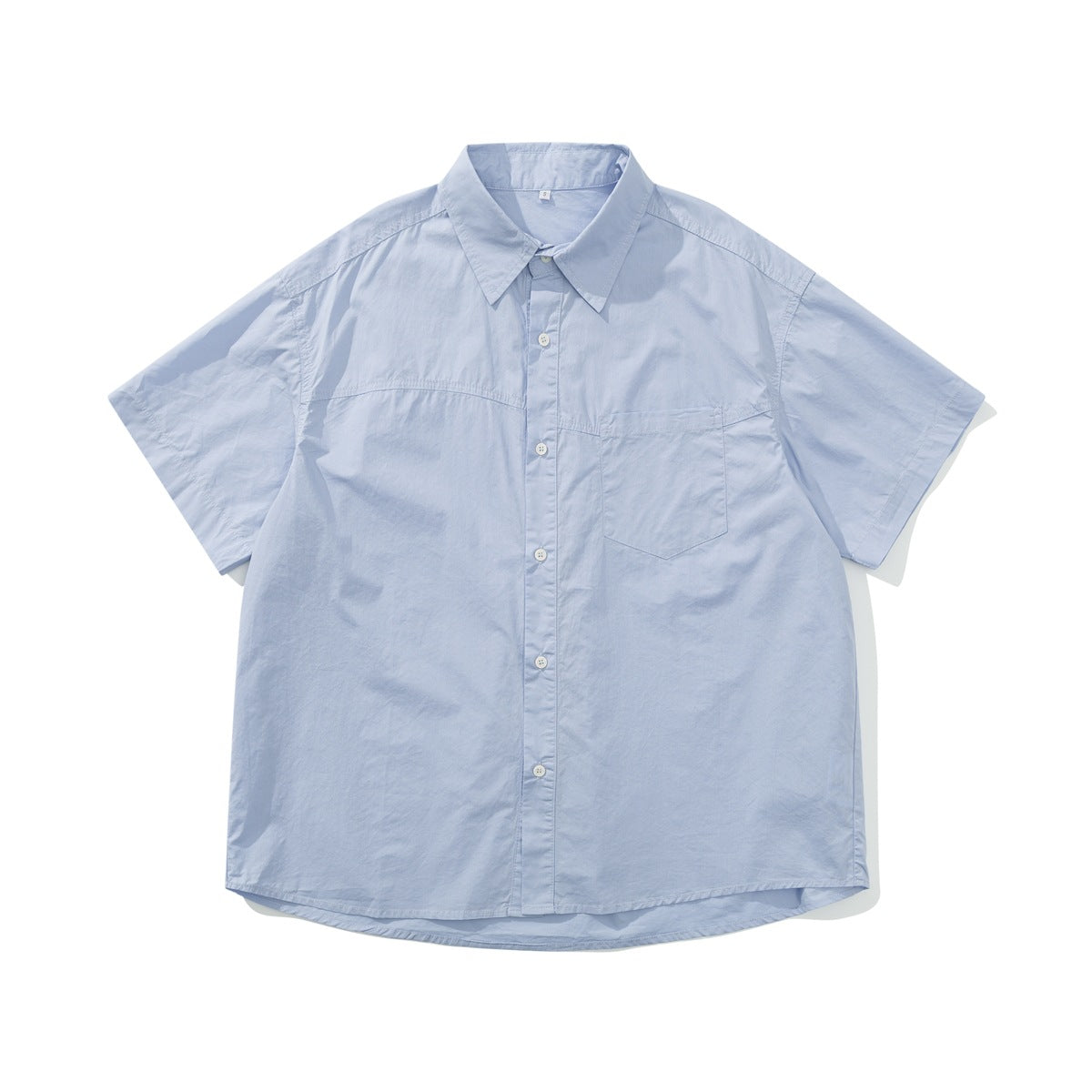 Light blue short-sleeve button-up shirt with pointed collar and chest pocket, flat lay front view
