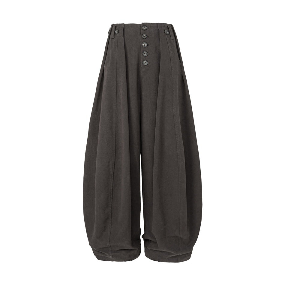 Dark gray wide-leg balloon pants with five-button front, waist tabs and pleats, flat front view