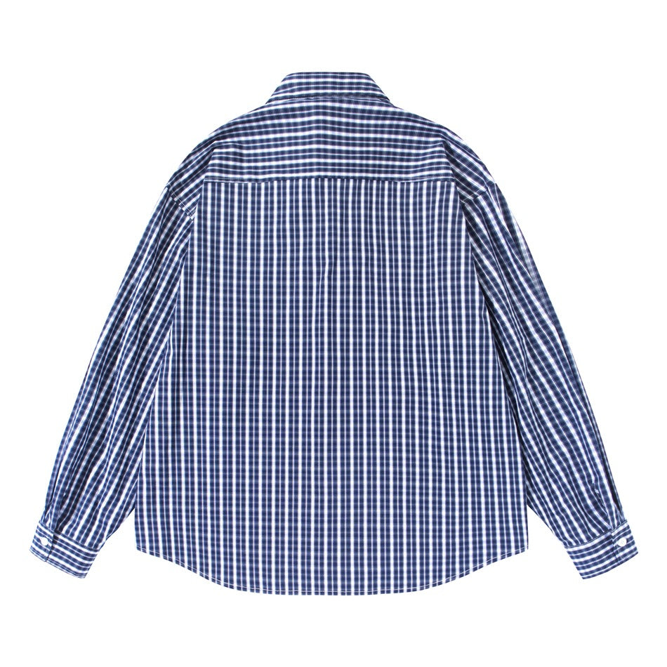 Back view of a navy and white checked long-sleeved button-up shirt laid flat.