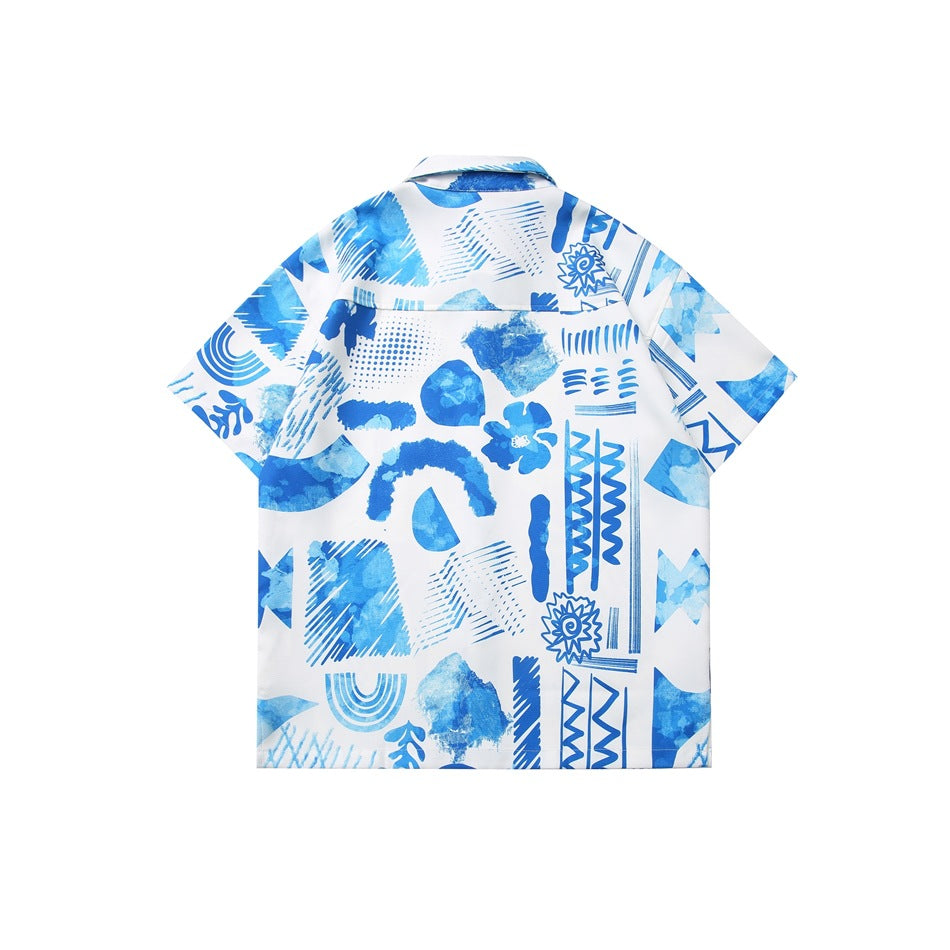 Back view of a white short-sleeve collared shirt with an allover blue abstract geometric print.