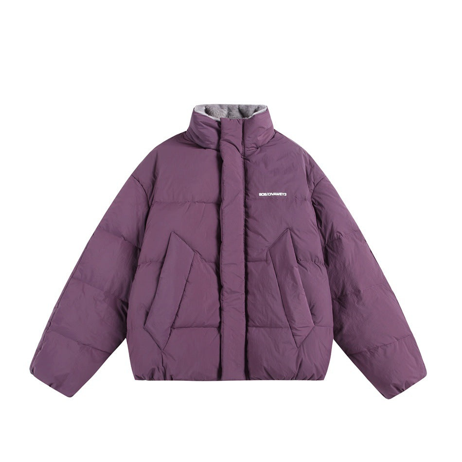 Purple puffer jacket closed at the front with stand collar, angled pockets and gray plush collar lining, flat lay