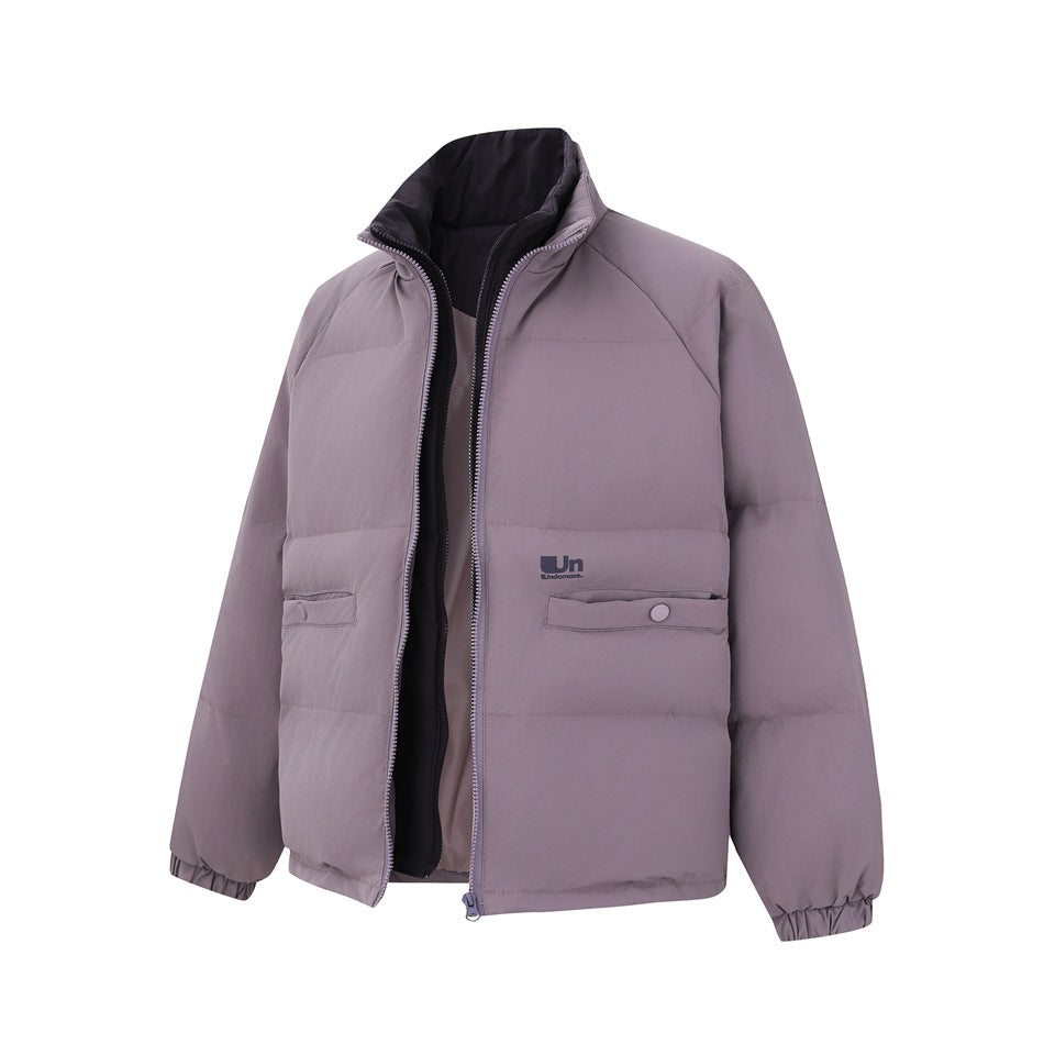 Muted lavender padded jacket shown from the front, partly unzipped, with a high collar and snap-button pockets.