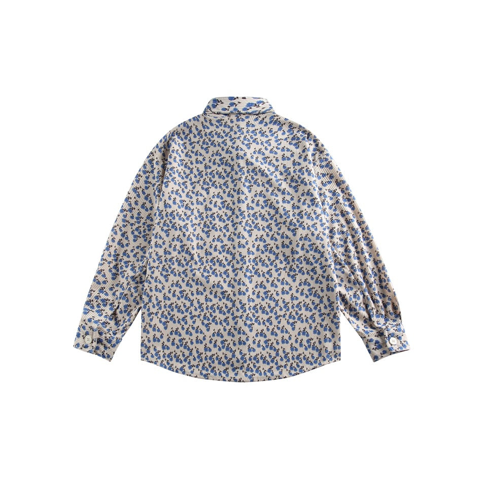 Back flat lay of a beige long-sleeve shirt with a small blue and dark floral print.