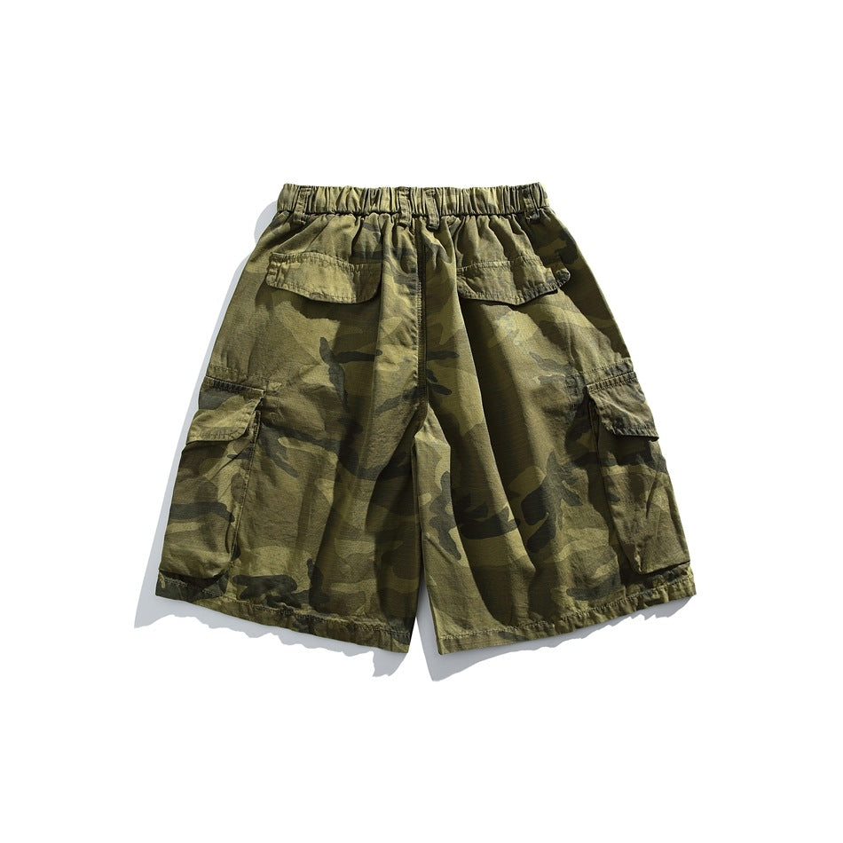 Army green camouflage cargo shorts with elastic waist, back flap pocket and side cargo pockets, back view