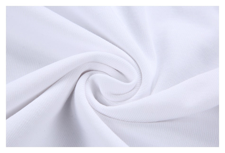 Close-up of white fabric gathered into a spiral, showing its fine knit texture.