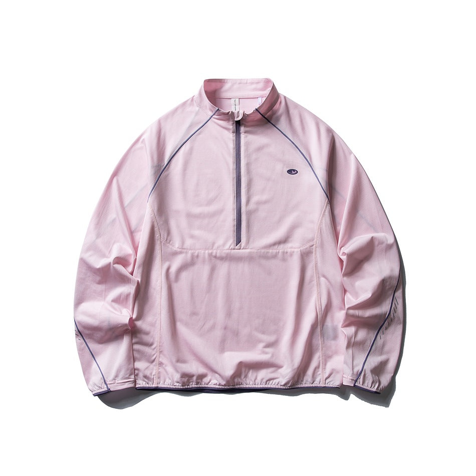 Cherry blossom pink half-zip stand-collar pullover with purple zipper and raglan piping, flat lay front view