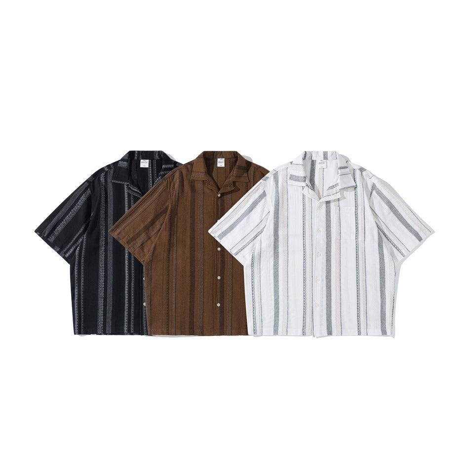 Three short-sleeve striped shirts shown from the front in black, brown, and white.