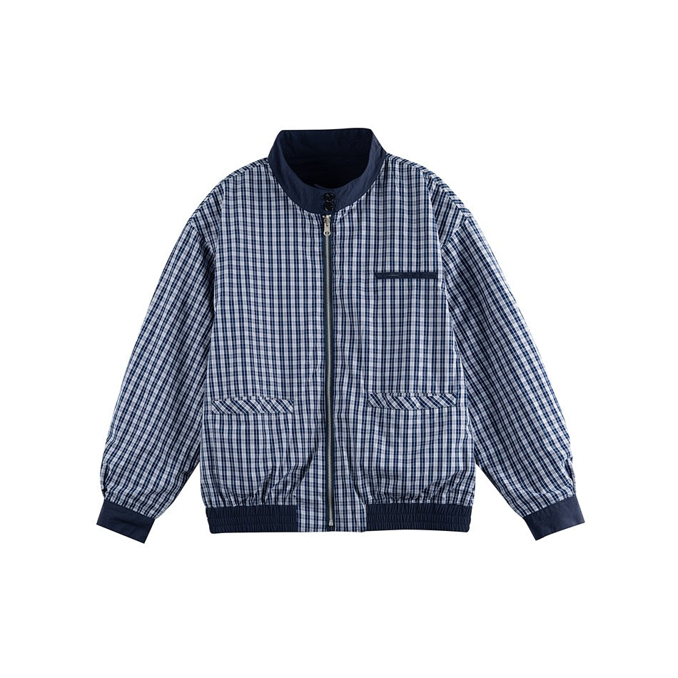 Reversed navy and white plaid zip jacket with navy collar, cuffs and hem band, flat lay front view