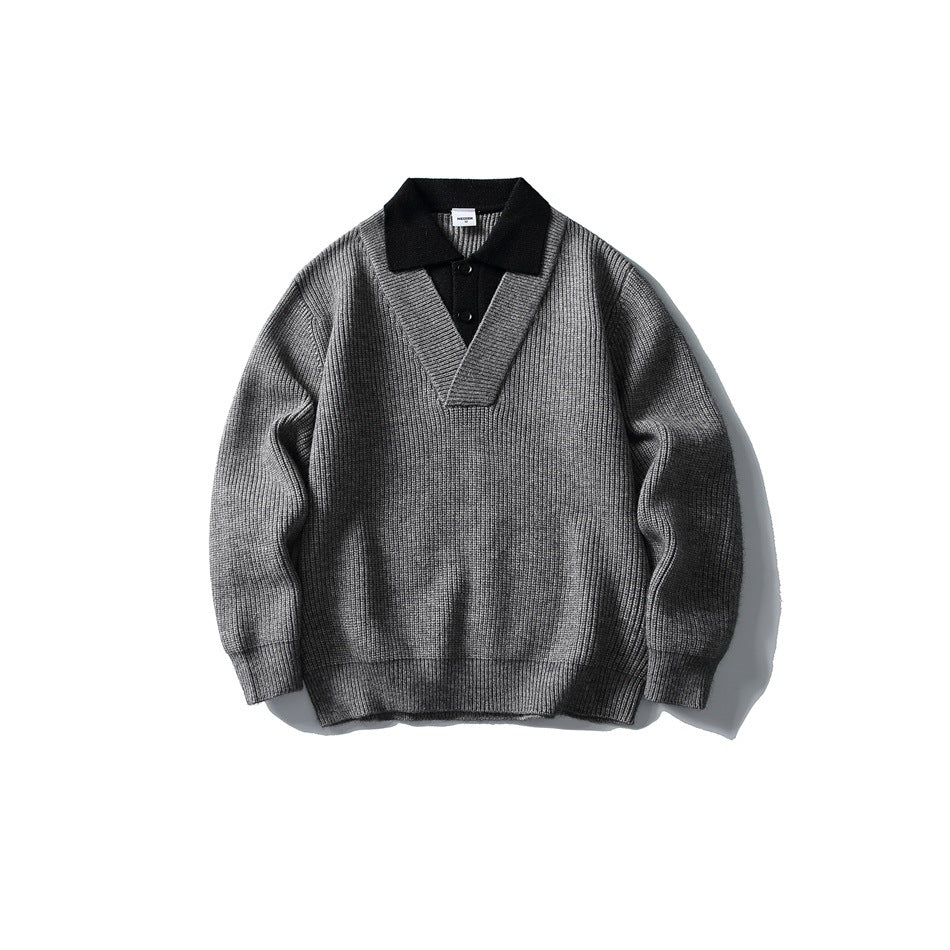 Gray ribbed-knit V-neck sweater with black polo-style collar and two buttons, flat lay front view