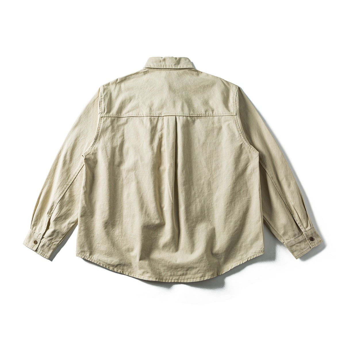 Back view of a beige long-sleeve button-up shirt with a center pleat and curved hem.