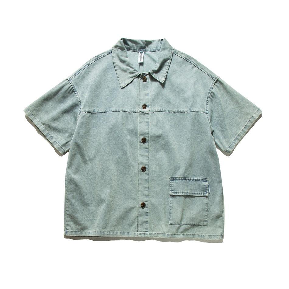 Washed light blue-green short-sleeve button-up shirt with flap pocket, front view flat lay