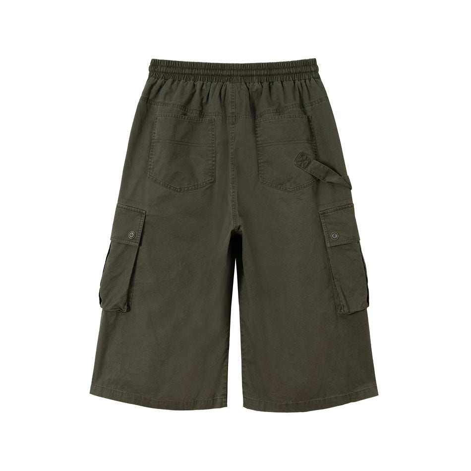 Olive green wide-leg cargo shorts back view showing two back patch pockets and side cargo pockets