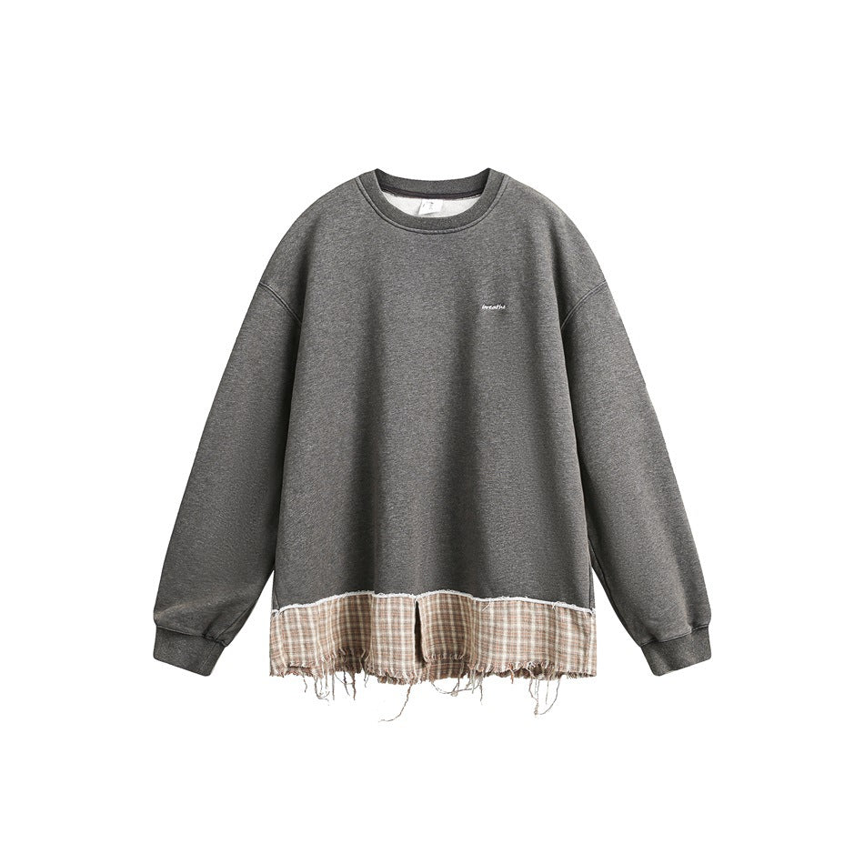 Gray crewneck sweatshirt with beige plaid frayed hem panel and small embroidered chest lettering, flat front view