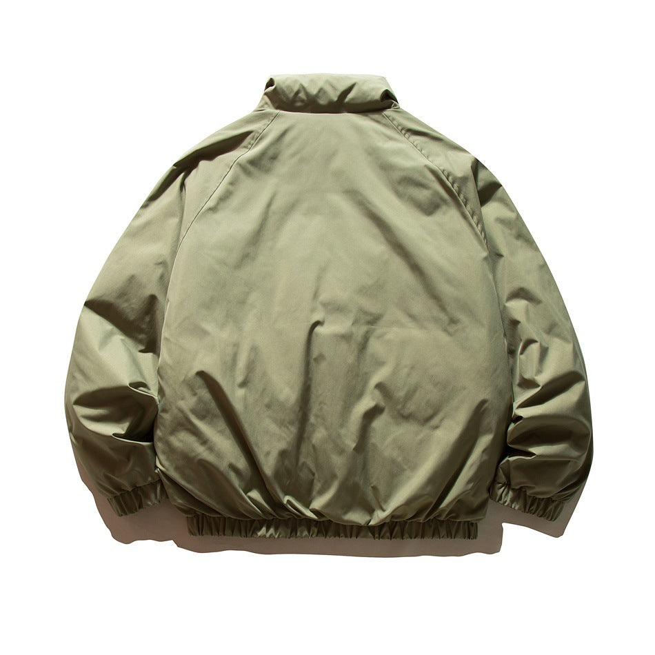 Back view of a bean green padded stand-collar jacket with raglan sleeves and an elastic hem and cuffs